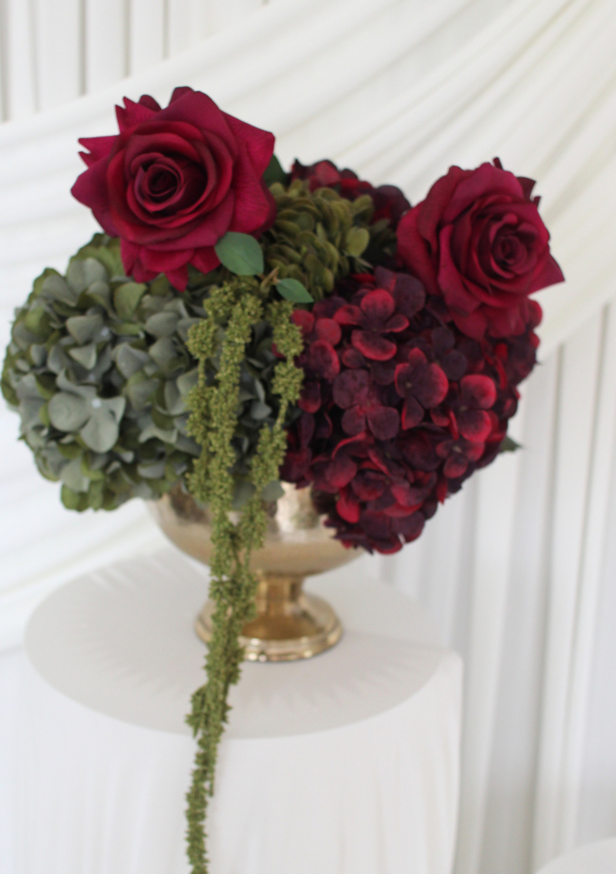 The Burgundy Muse Deep Urn display