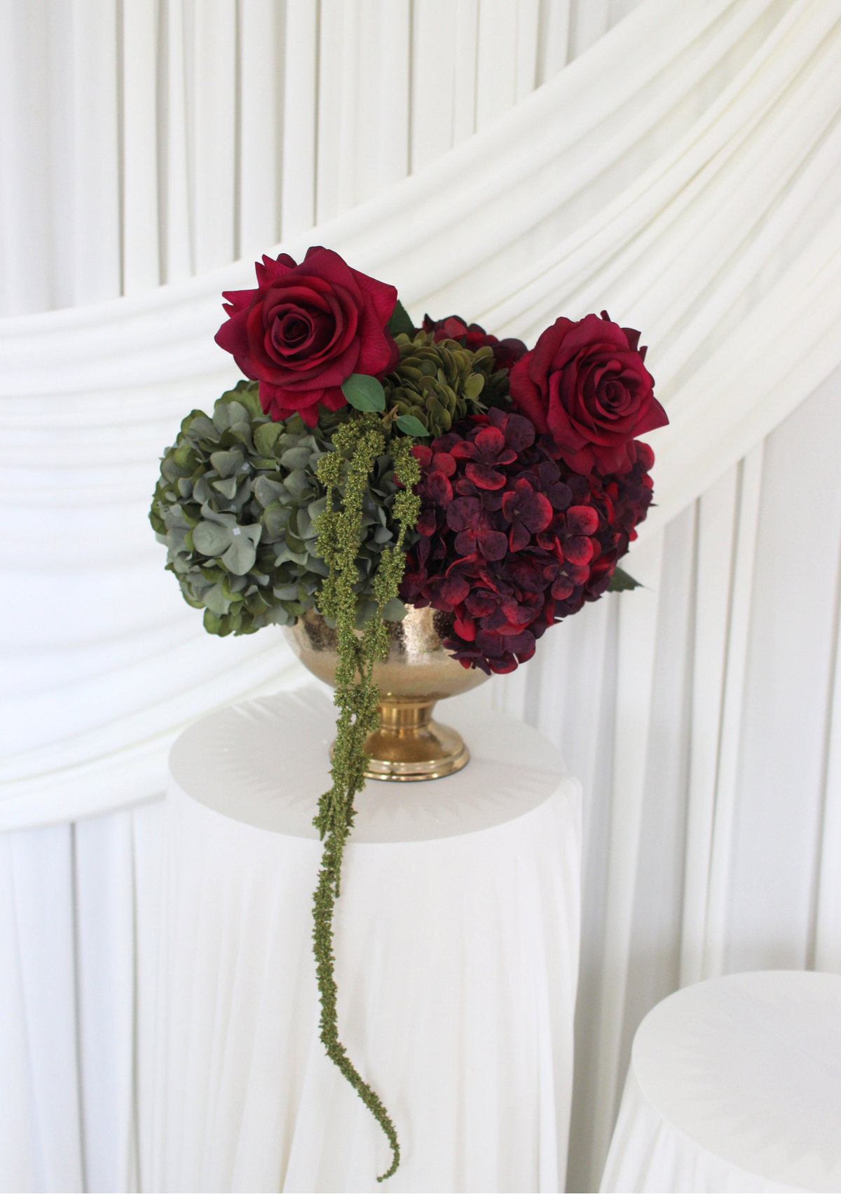 The Burgundy Muse Deep Urn display