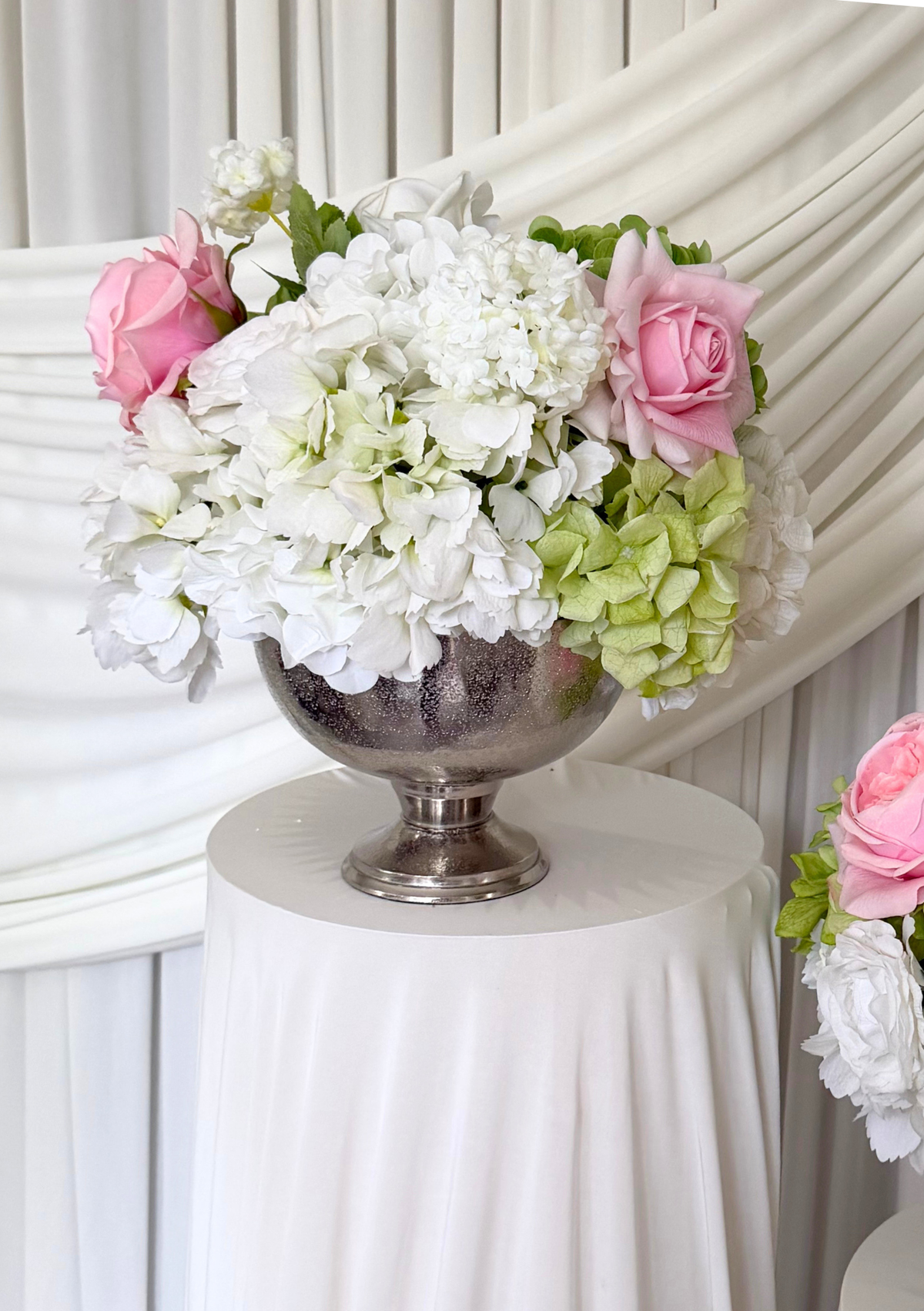 The Botanical Blush Classic Urn display